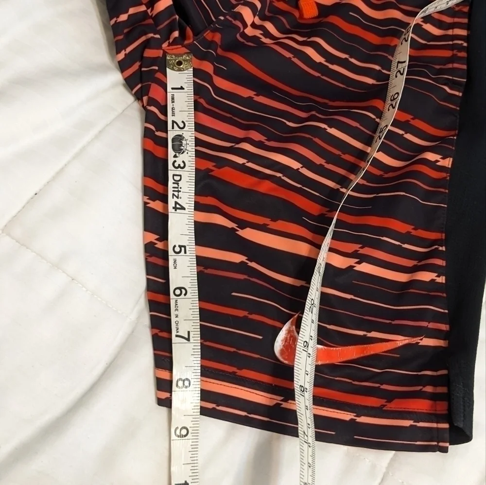 Nike Dri-Fit striped athletic shorts with an elastic waist size Large